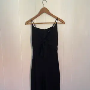 Black jumpsuit with bow 