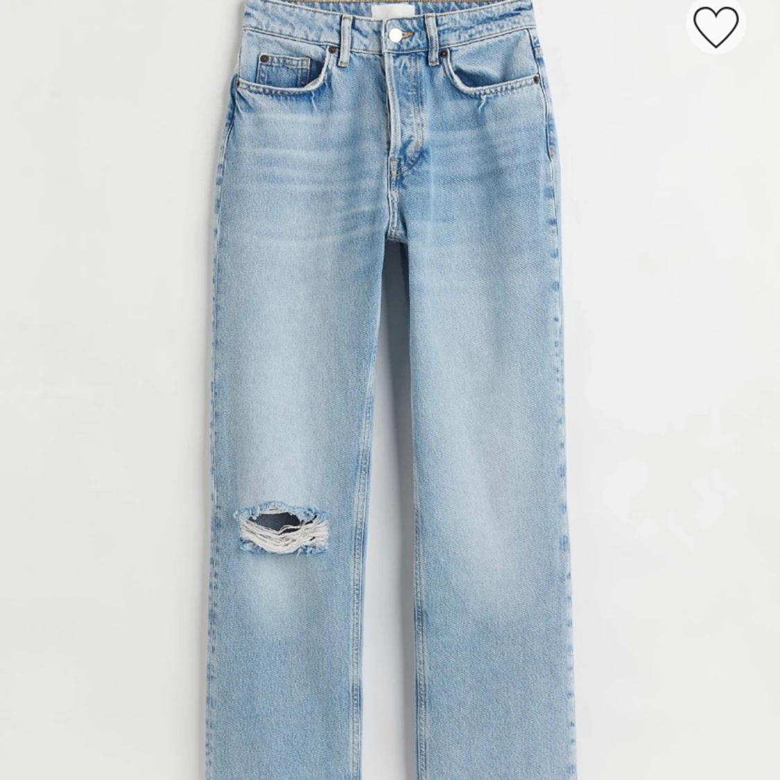 Raka jeans med slitning