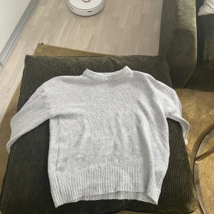 Stickad tröja  - Aldrig andvänd