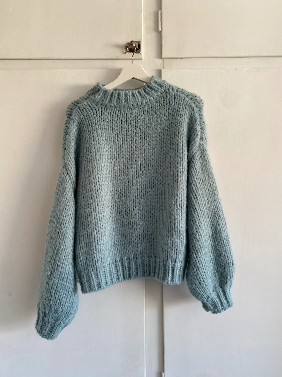 Ljusblå stickad tröja