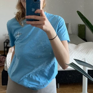 Calvin Klein T-shirt  - T-shirt från Calvin Klein jeans i storlek M. 