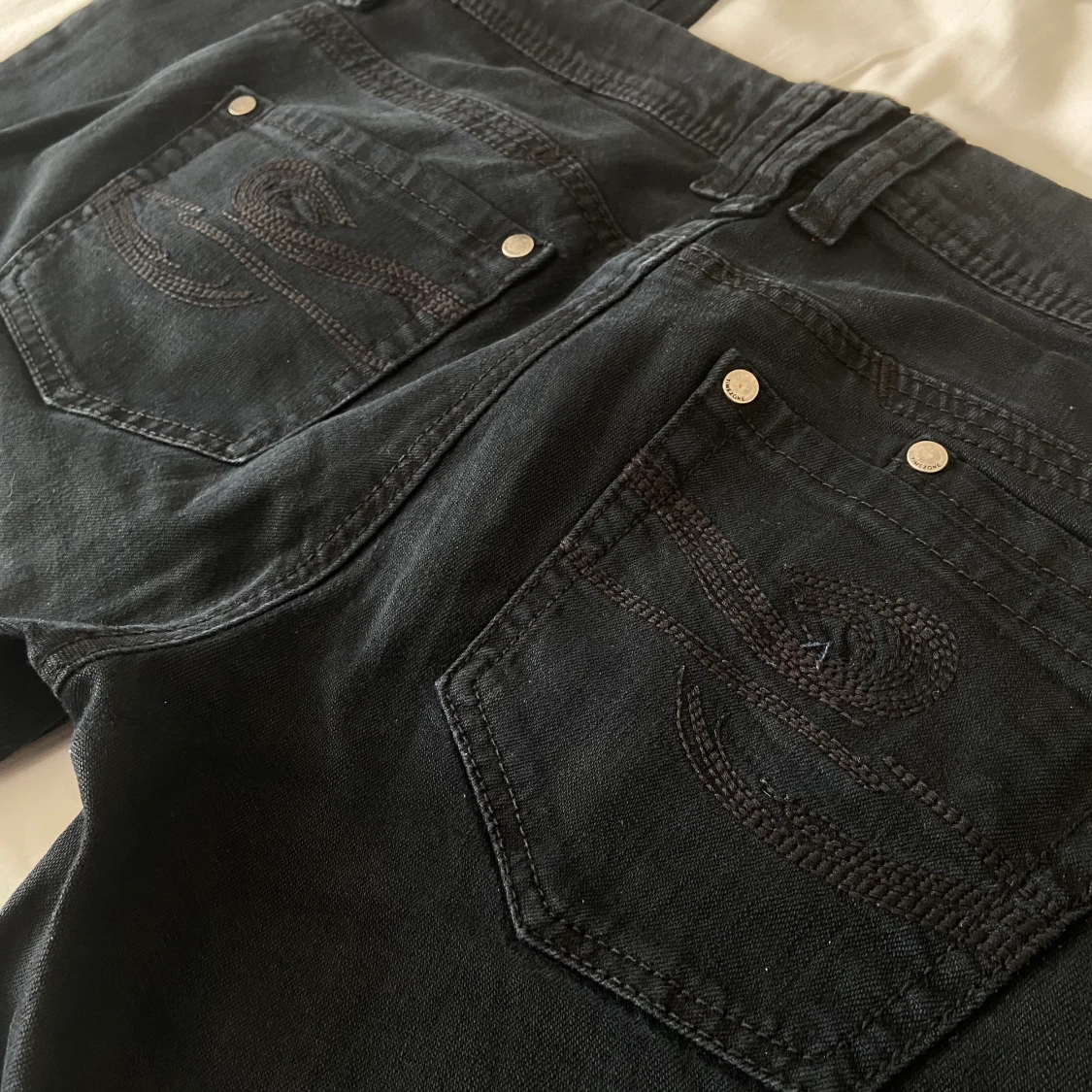 svarta lågmidjade bootcut jeans - 91