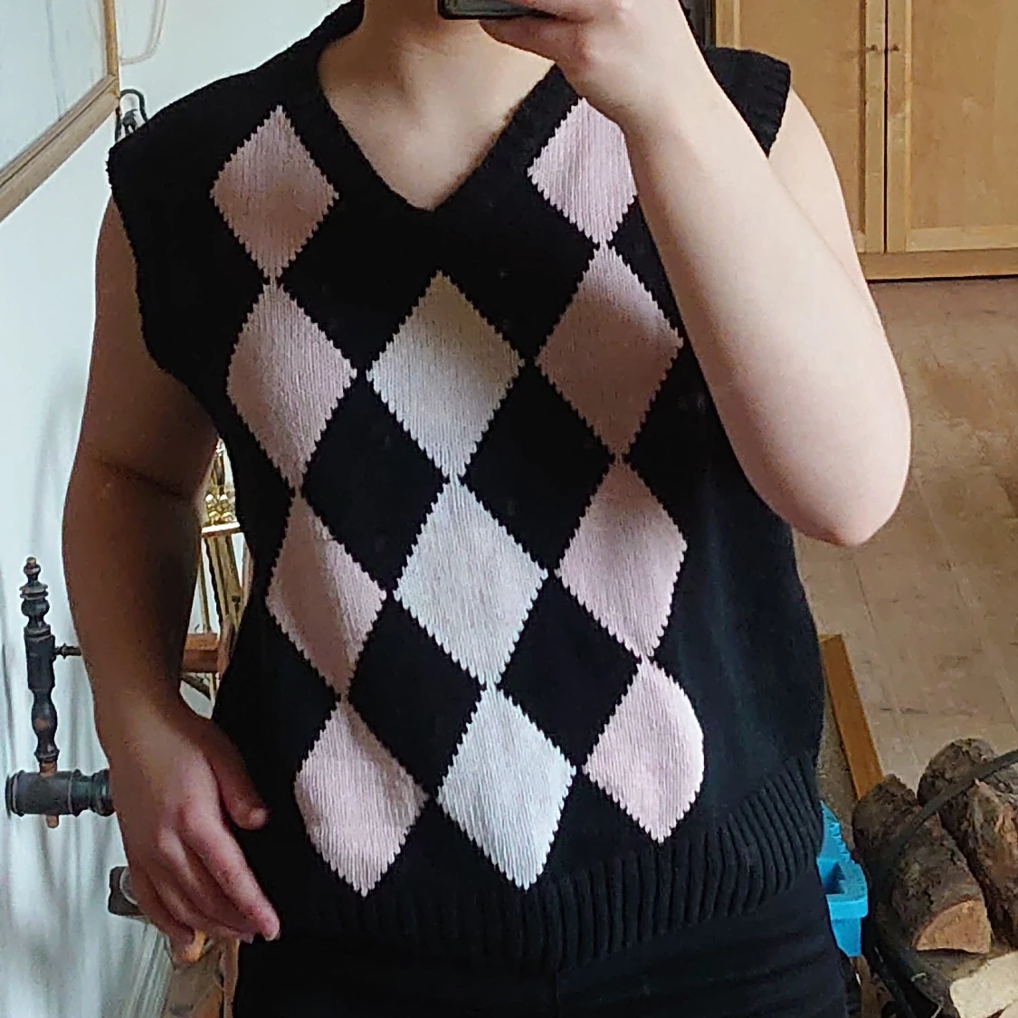 Svart och rutig väst