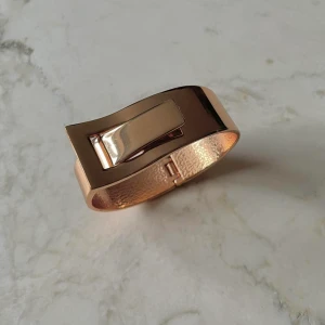 Rose Metallic Clasp Bracelet - Minimalist Rose Metallic Toned Cuff Bracelet  Rose Gold color  gently worn, subtle scratches   7CM Rose Gold color Bracelet 