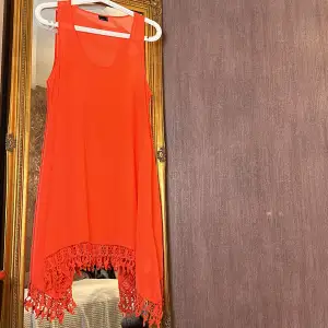 Orange strand klänning 