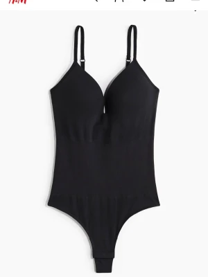 Svart body med justerbara band - Hm body stl xs - använd 1 gång .