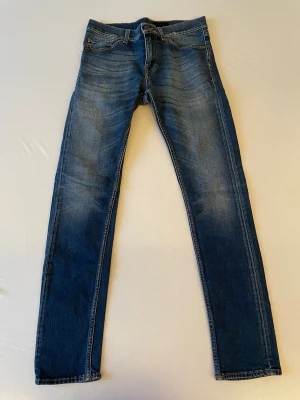 Tiger of Sweden Evolve  - Tiger of Sweden jeans modell Evolve i slim fit storlek 28/32. I utmärkt skick! 