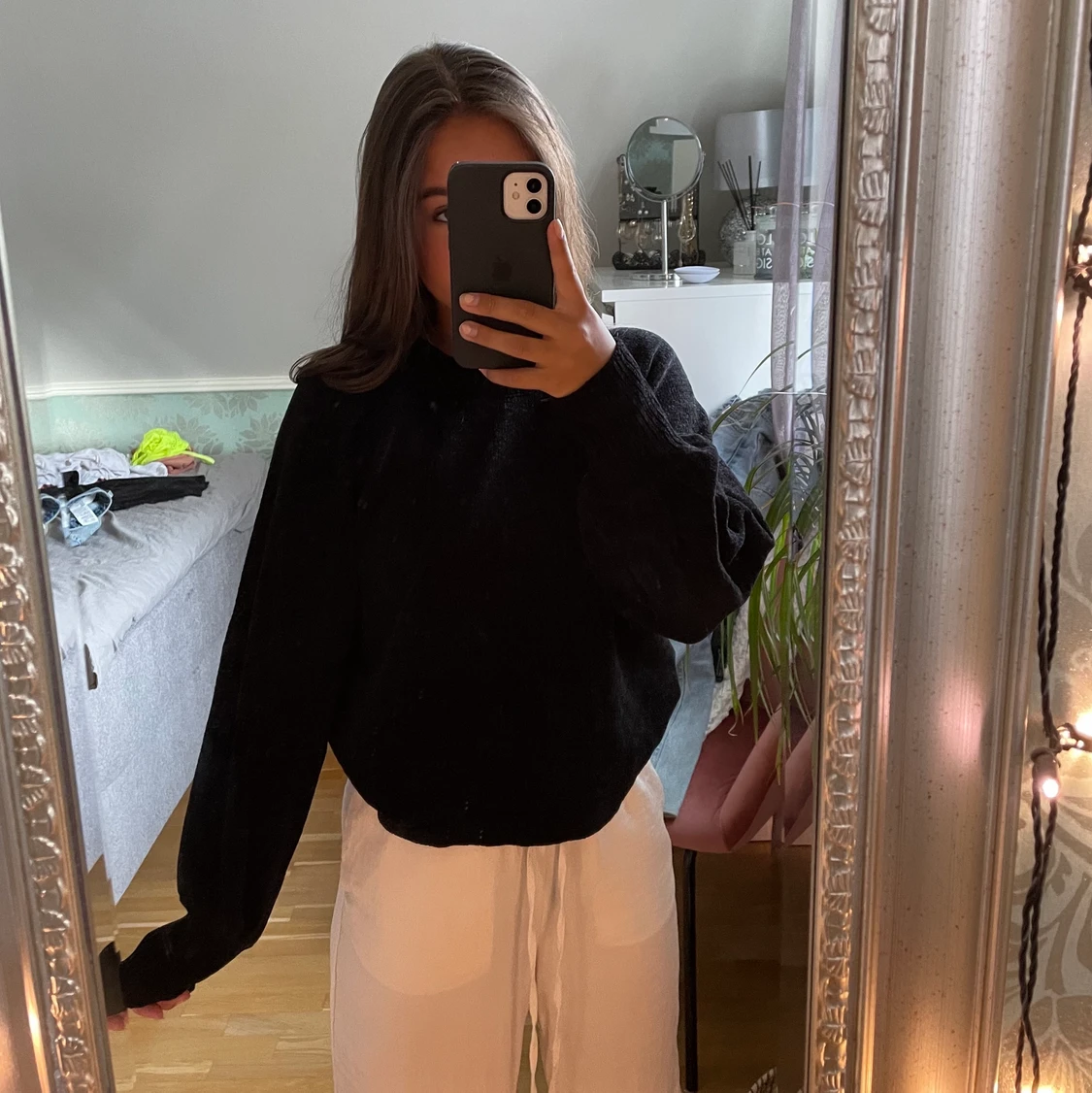 Svart stickad tröja