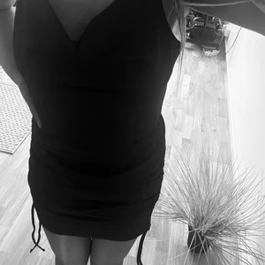 Mörkbrun klänning  - Köpte den från H&M. 