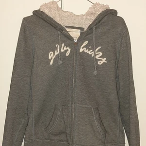 Gilly Hicks Hoodie, L - Grey Gilly Hicks hoodie, size L. In good condition, and mildly warm. With white garnment on the inside. The first picture is the truest to color.