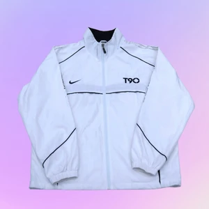 Vintage Nike Track-Jacket ”T90” - Vintage Nike Trackjacket. Size: L. Utmärkt vintageskick.