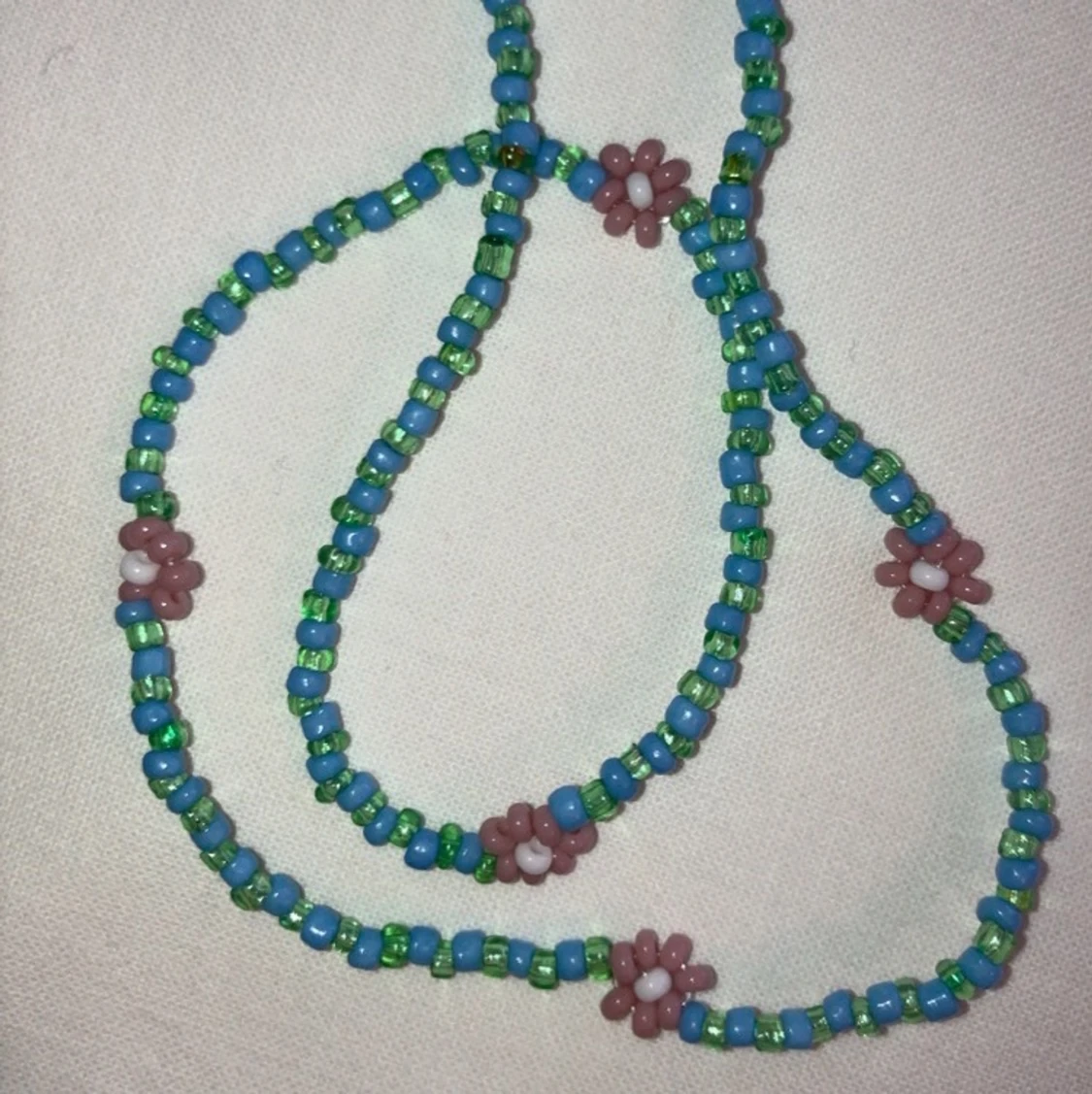 Halsband blommor - 91