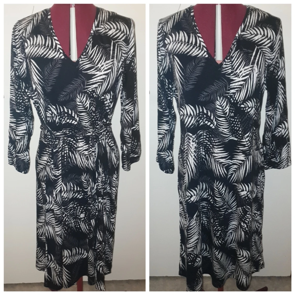 NY svart klänning med fjäder motiv