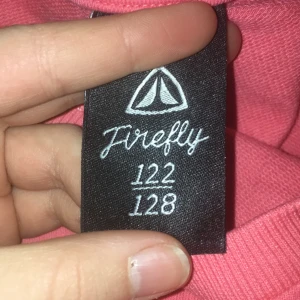 Magtröja - Korallfärgade magtröja i tjockare trikåtyg, typ sweatshirt. Använd ett fåtal gånger.