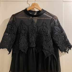 Nice black top - Good condition, never worn it 