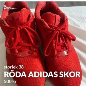 Röda adidas skor i storlek 38. Sparsamt använda.