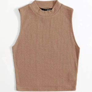 Trendiga Crop-tops 2 st. I fina färger  - 2 st. Aldrig använda. I 2 olika färger    Storlek = L men dom är mer som M     Byst = 84,5cm.   Längd= 44cm.           Pris= 45kr st.  Båda för 80 kr. 