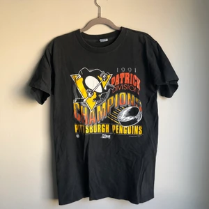 Vintage Tshirt - Vintage T-shirt från beyond Retro. Storlek S-M