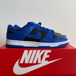 Nike Dunk Low Retro Black Hyper Cobalt - Nike Dunk Low Retro Black Hyper Cobalt. Brand new. US11/ EU 45. 1299kr. Meet up in Stockholm available. No trade/exchange.
