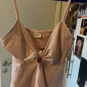 Söt topp från Gina  - Helt oanvänd. Står ej storleken men skulle säga S/M