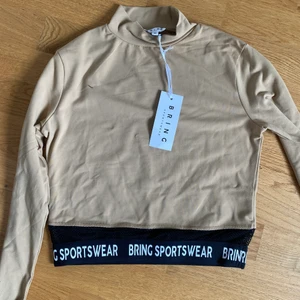 BRING Crop Top MEDIUM - Träningstop, helt ny och oanvänd 