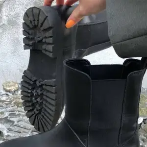 Black leatherboots from COS. 