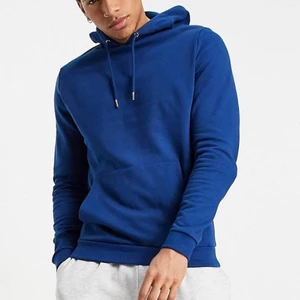 Blå hoodie - Hoodie köpt på ASOS som endast är testad. Säljes billigt pga att den aldrig kommer till användning! Sitter snyggt oversized på mig som oftast har XS/S. (Bilderna är lånade från ASOS, skriv i dm för bilder på)