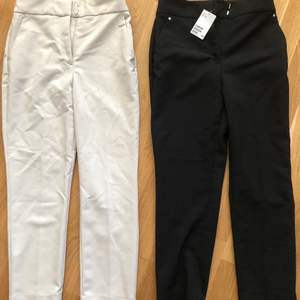 Kostymbyxor två par från H&M. Dom svarta är helt oanvända och dom beiga är använda en gång. Båda i strl 36 Säljer båda par för 100kr totalt