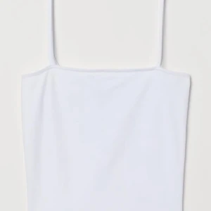 Linne - En vit ny linne från H&M i storlek S. 