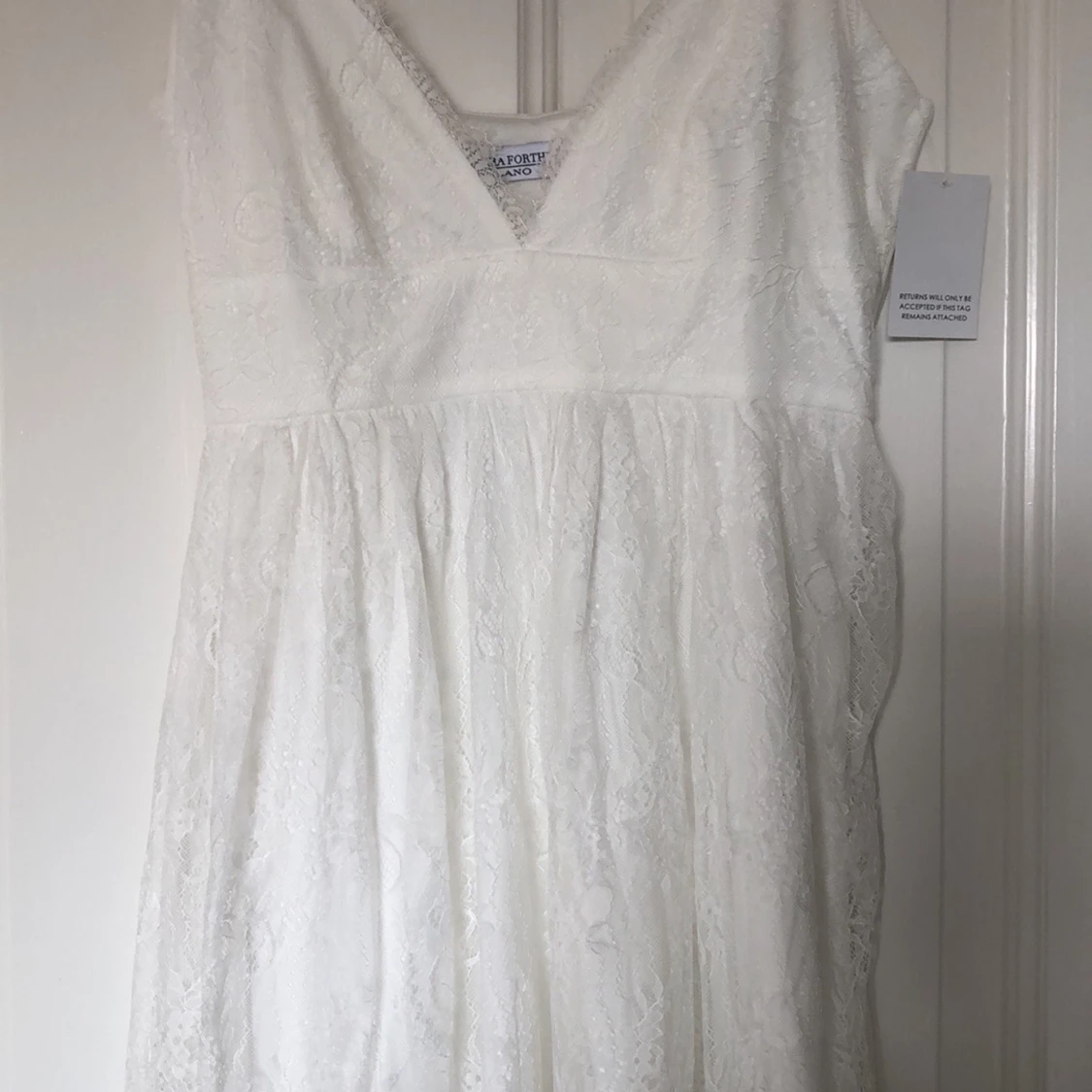 Oanvänd studentklänning 