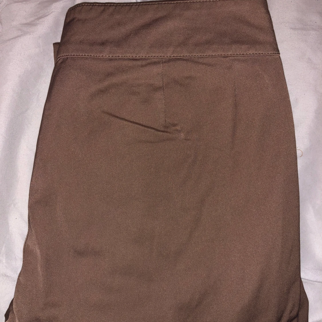 Lågmidjade bruna kostymbyxor  - 90