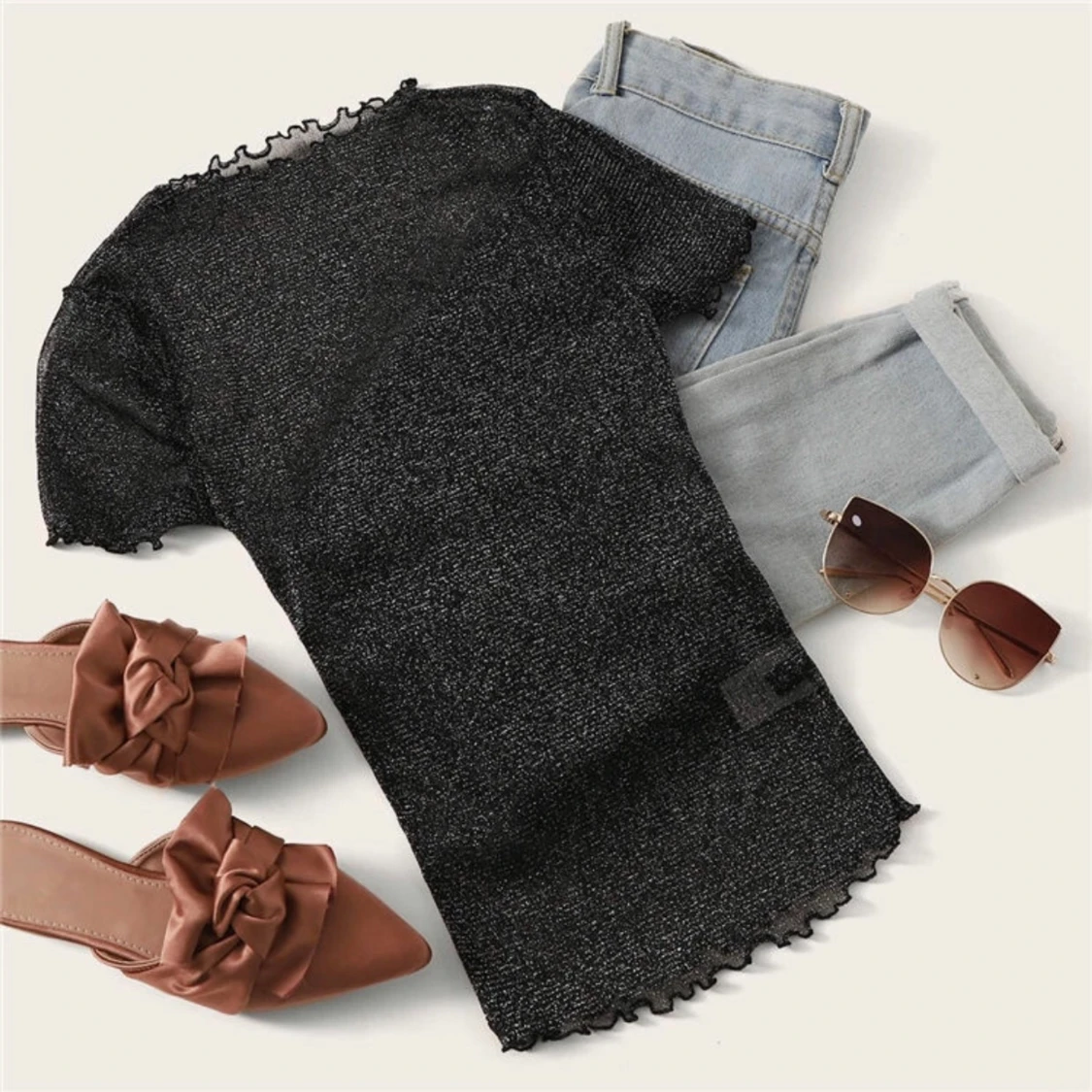 Glittrig genomskinlig topp