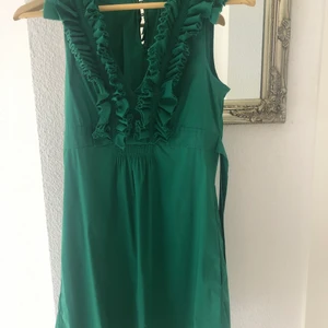 Klänning  - En jätte fin grön klänning i stl xs 