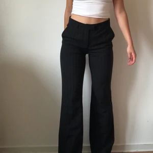 Randiga kostymbyxor - EU 38