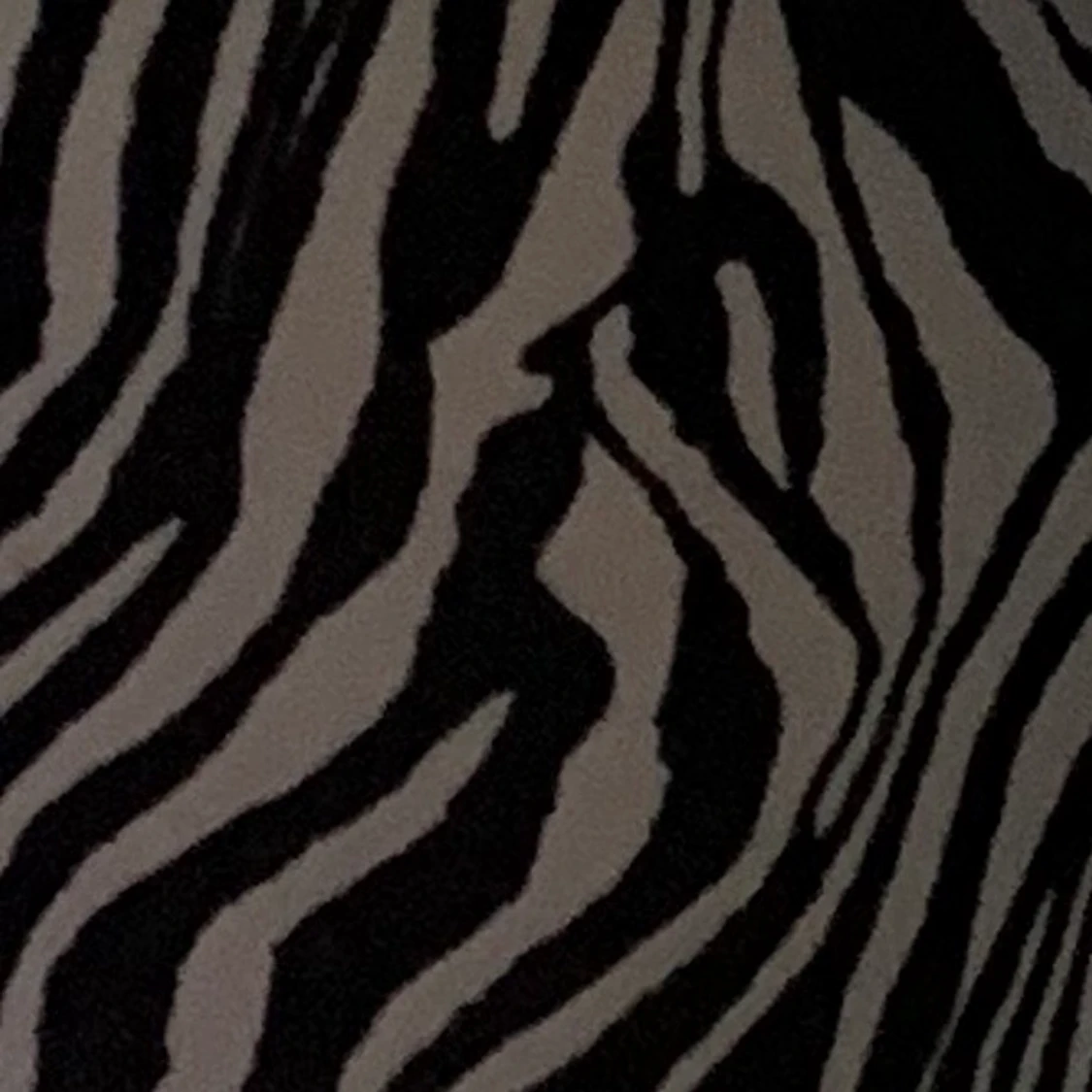 Högmidjade bootcut zebrabyxor  - 91