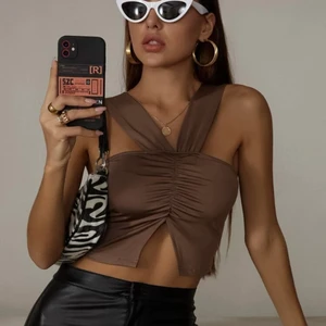 Topp - Frakt på 48 tillkommer