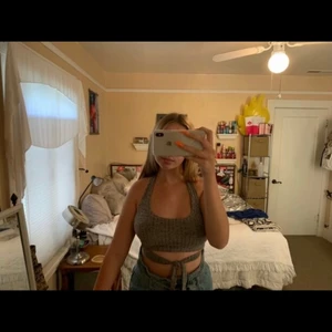 Cute grey top! - Tie front ribbed halter top. Gray, fits S and M! Runs short tho