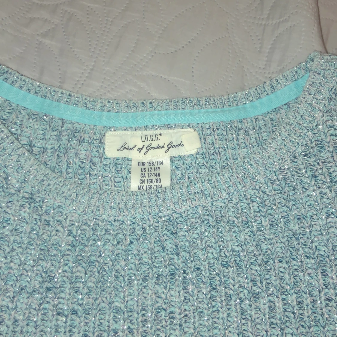 Blå/silverglittrig stickad tröja - 91