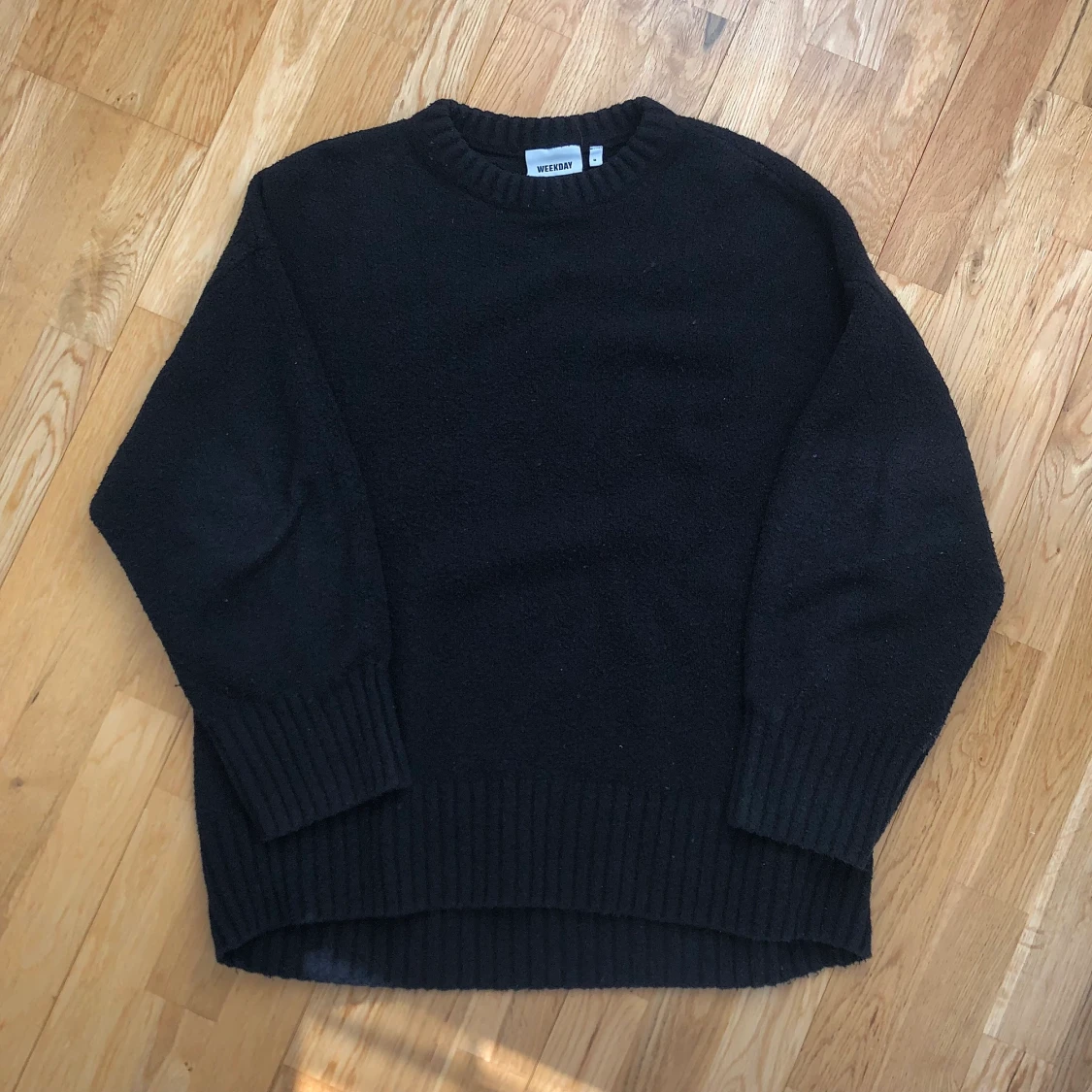 Svart stickad tröja