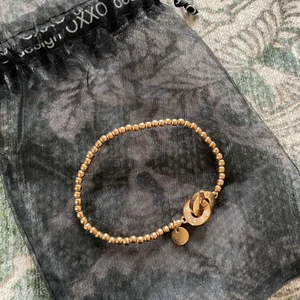 Guldigt armband helt nytt  - Superfint armband i sin originalpåse. 