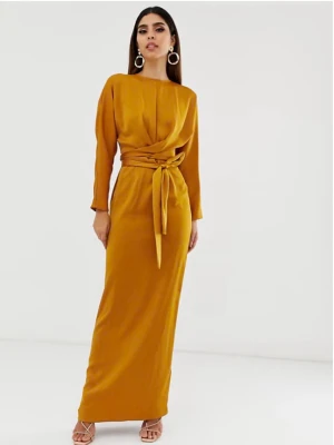 Senapsgul långklänning med knyt - Säljer en stilren senapsgul långklänning från ASOS, storlek 36. Klänningen har långa ärmar och ett snyggt knytdetalj i midjan. Den är använd en gång och är i mycket bra skick. Perfekt för dig som vill sticka ut med färg och stil! Originalpris: 789 kr 🌸