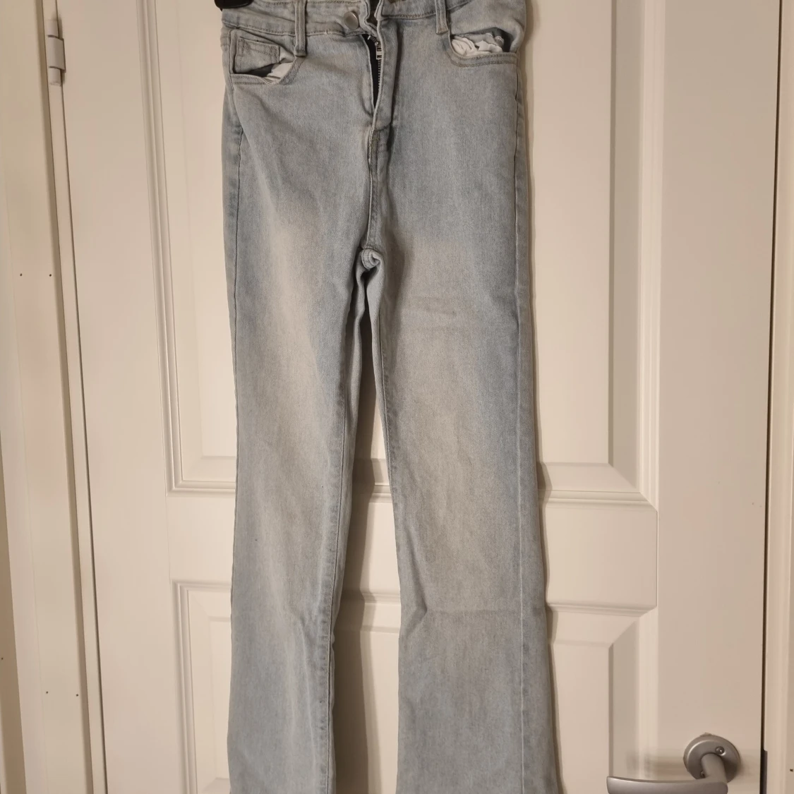 Ljusblå bootcut jeans