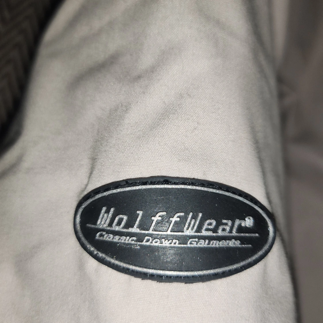 Beige dunjacka från Wolffwear