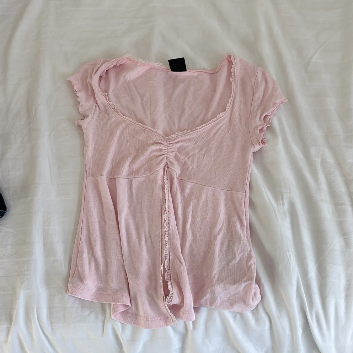 Ljusrosa omlottopp från Gina Tricot