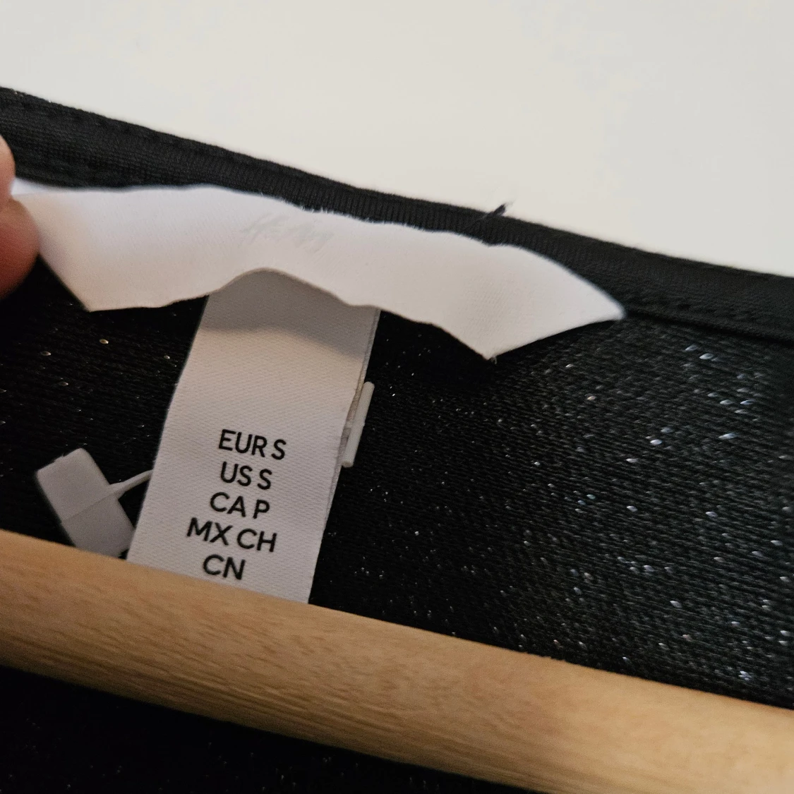 Svart glittrig body från H&M - 1