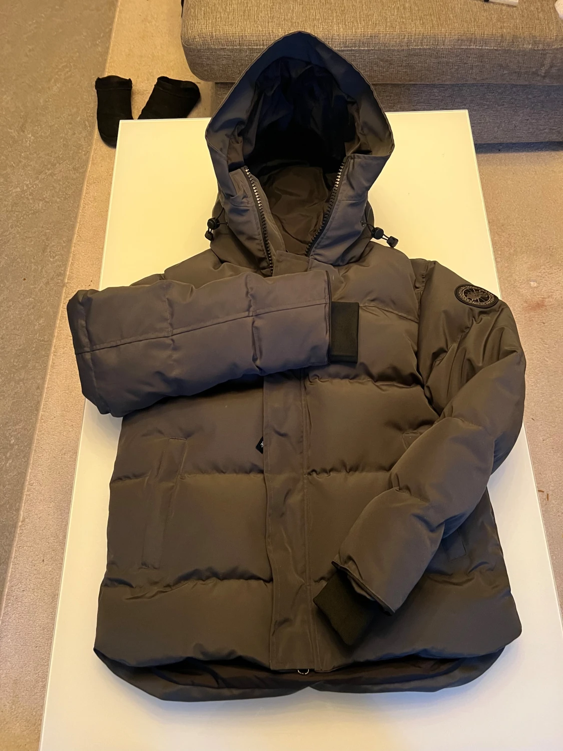 Macmillan canada goose grå black badge