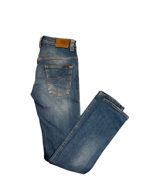 Nudie jeans  - Sköna blåa Nudie jeans i storlek W29 L34. Modell Thin Finn. 