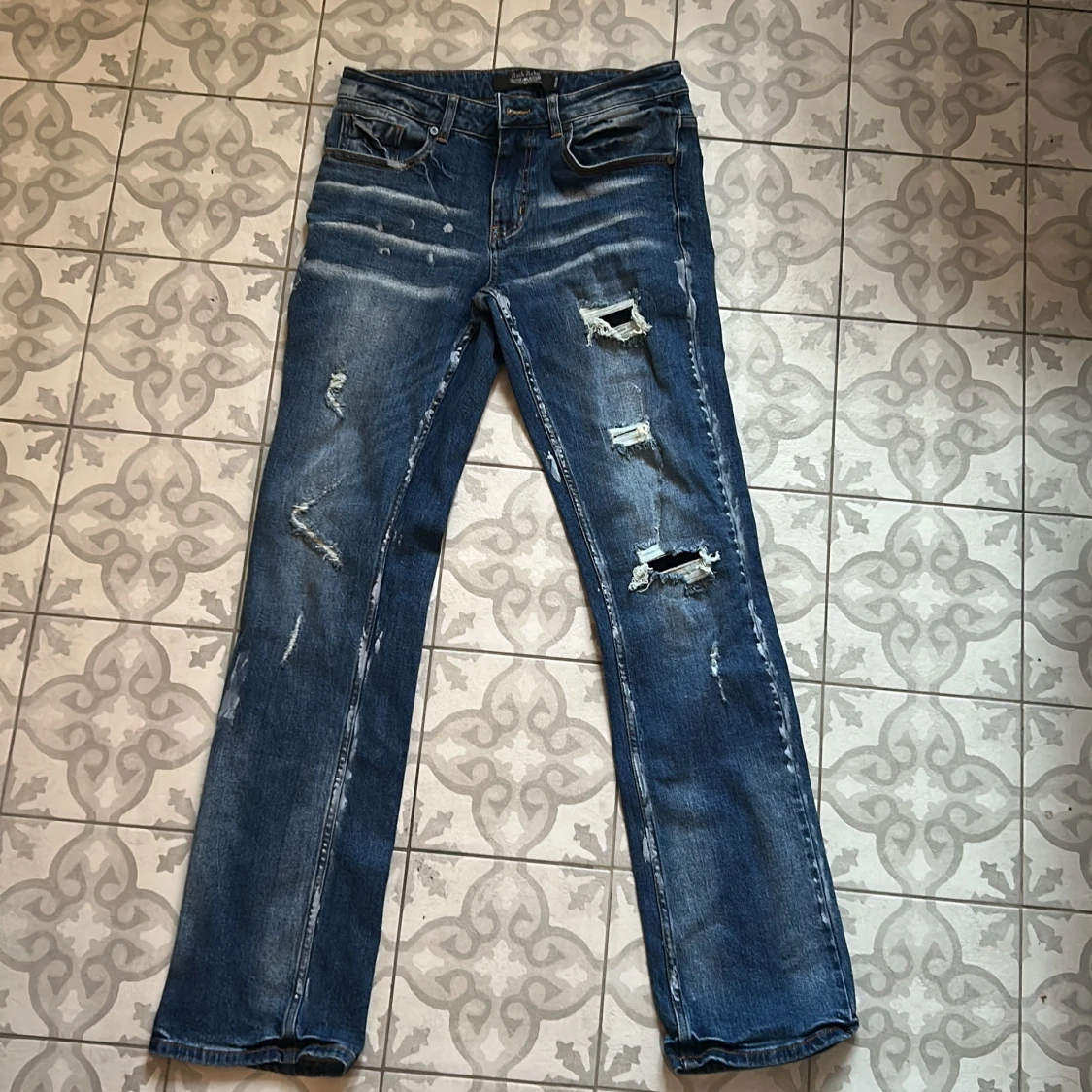 Rock Rebel blå slitna jeans W30 L32