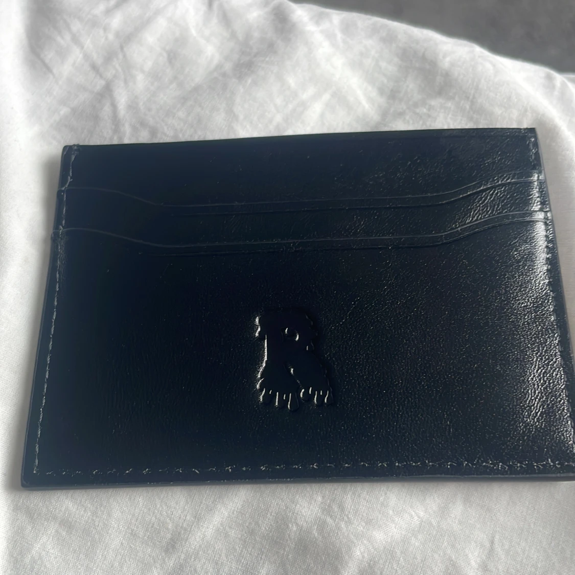 Svart korthållare från Risky - 1