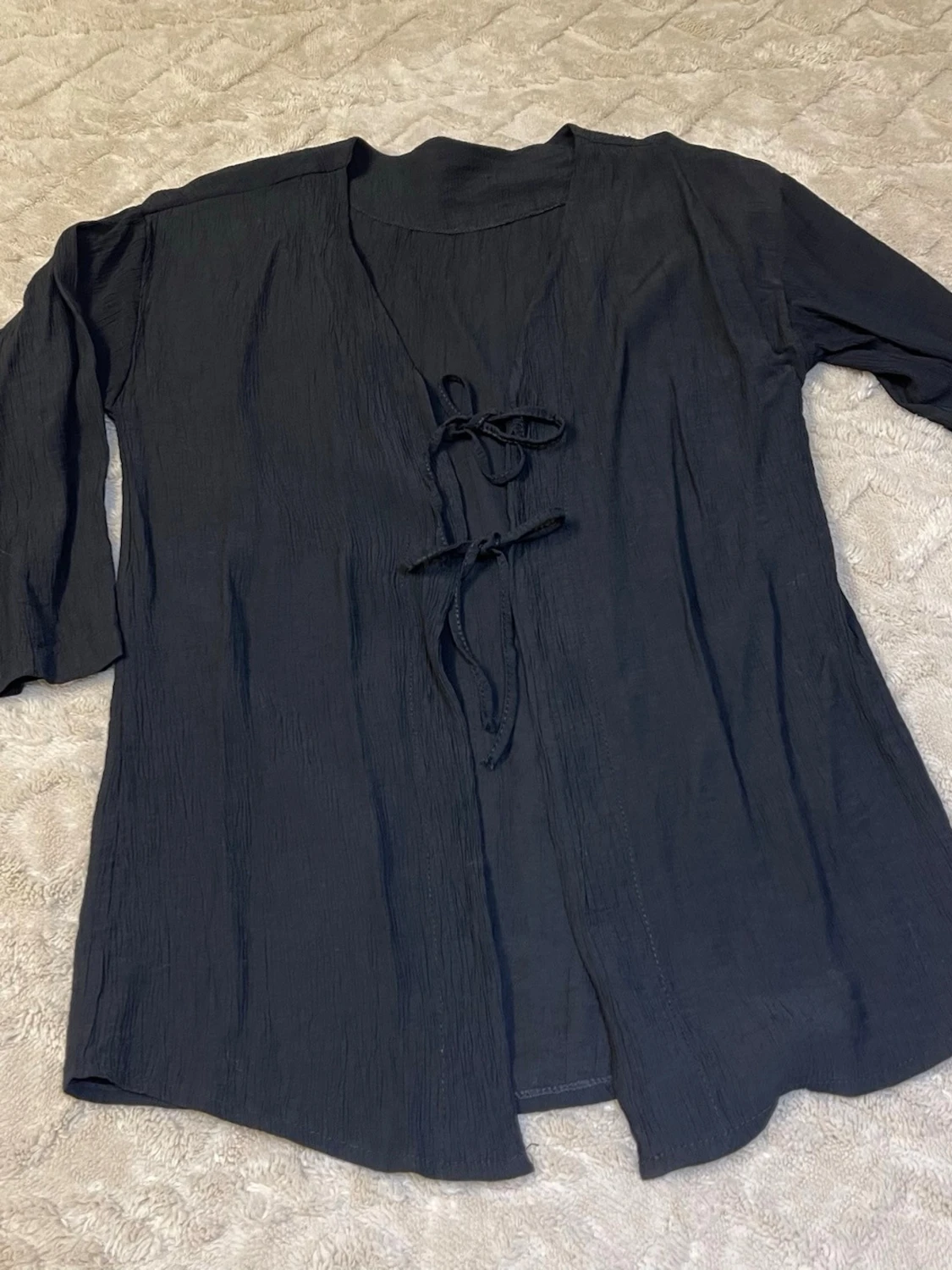 Svart kofta med knytband - 1